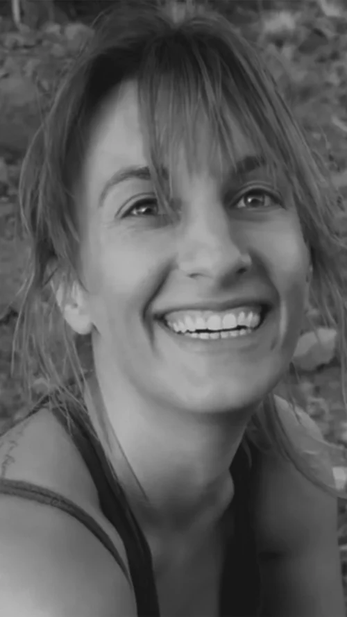 Maria Kirov smiling bright into the camera
